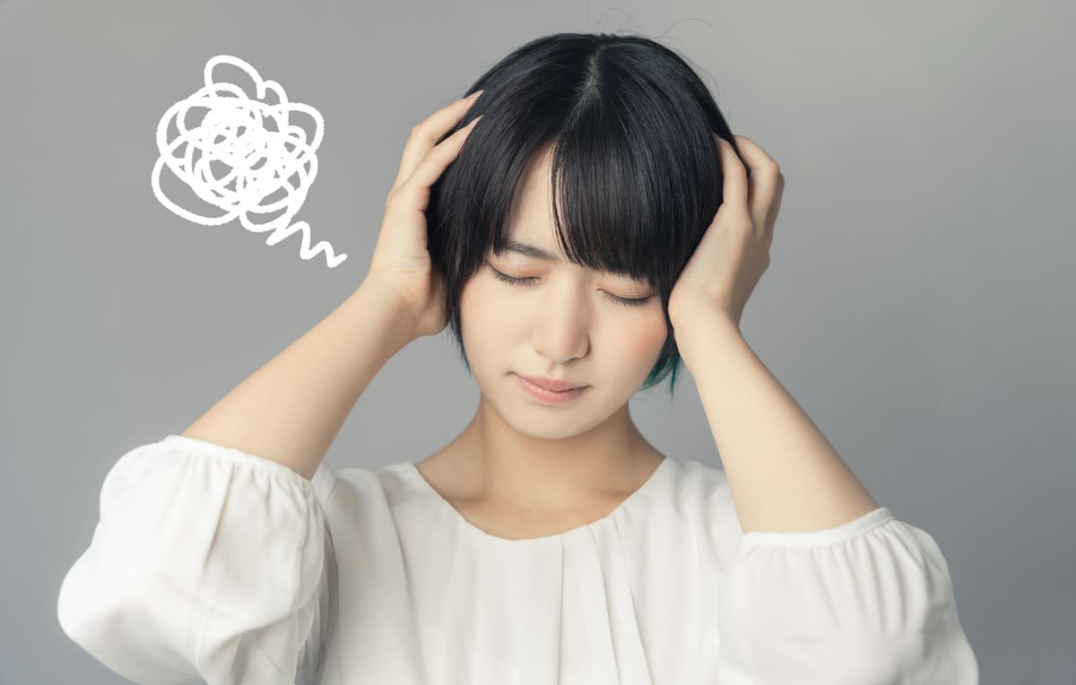 困り顔の女性